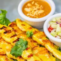Chicken Satay · Gluten Free. Grilled marinated chicken on skewers served with peanut sauce and cucumber reli...