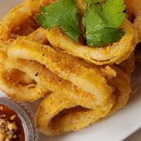 Fried Calamari · Batter fried calamari served with sweet & spicy sauce with peanut topped.