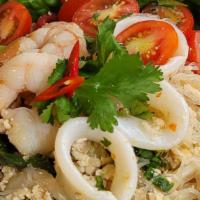 Yum Woon Sen (Glass Noodle Salad) · Gluten Free, Spicy**, Steamed glass noodle, minced chicken, shrimp, calamari, chili jam, whi...