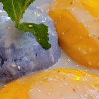 Mango Sticky Rice · Mango with coconut sticky rice, topped with sesame seed.
