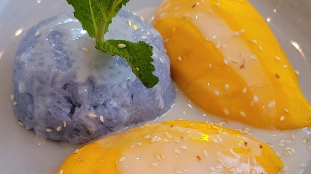 Mango Sticky Rice · Mango with coconut sticky rice, topped with sesame seed.