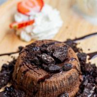 Chocolate Lava Cake · Served with Oreo crumble, vanilla ice cream.