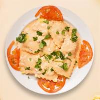Meat Amante Ravioli · Fresh ravioli filled with minced meat cooked with creamy tomato sauce.