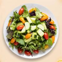 Casa Salad · Lettuce, cherry tomatoes, carrots, onions dressed with lemon juice & olive oil.
