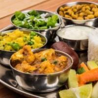 North Indian Selection · Served with rice, naan, raita, mango chutney and water with your order.