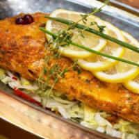Tandoori Genghis Queen · Roasted red snapper with fresh green chilies, cilantro pesto.