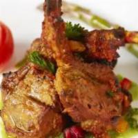 Changezi Champon · Grilled scented roast lamb chops drizzled with traditional Indian spices.