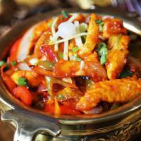 Chicken Chilli (Chicken Manchurian) · Marinated boneless chicken deep-fried in Indian Chinese chili sauce, tossed with gingery soy...