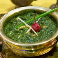 Chicken Saag (Spinach)  · Chunks of chicken cooked in a creamy spinach gravy perfumed with cinnamon and cumin seeds.