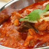 Lamb Roganjosh · Lamb cooked with fennel scented gravy and spices.