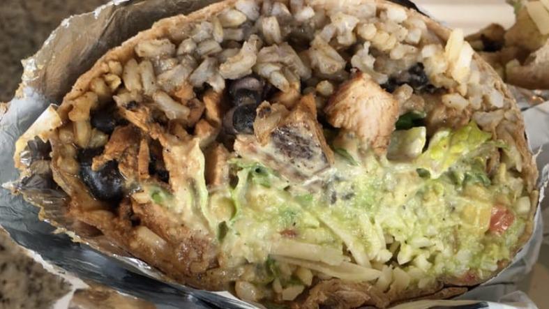 Pollo Burrito · Sabrosa Mexican favorite: Grilled chicken. Served in flour tortilla with cheese, black, pico de gallo and sour cream.