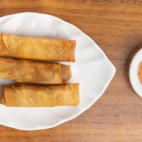 Duck Spring Roll / 鸭卷 · Rice paper or crispy dough filled with shredded vegetables.