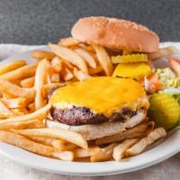 Cheeseburger Deluxe · Served with lettuce tomato pickle and french fries.