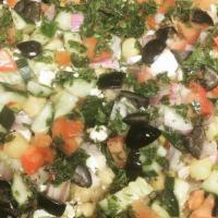 Chickpea Salad · Chickpea, feta cheese, onion, tomato, cucumber, olives topped with lemon-parsley vinaigrette...