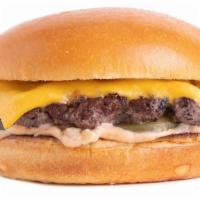 The Umami Burger (Single) · Smashed Patty, Dashi Onions, American Cheese, Pickle Chips, Umami Sauce on a Squishy Bun.