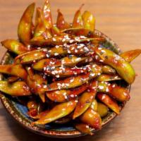 Edamame Togarashi · Himalayan salt flakes, sweet chili glaze, chili strips.