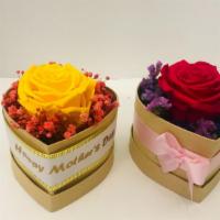 Heart Forever Love Box · Preserved rainbow rose in a heart shaped box.
Color may vary depends on availability.