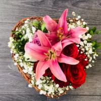 Heart Mix Flower Bouquet · Heart shaped basket filled with different types of natural flowers.
Note:Flowers may changed...