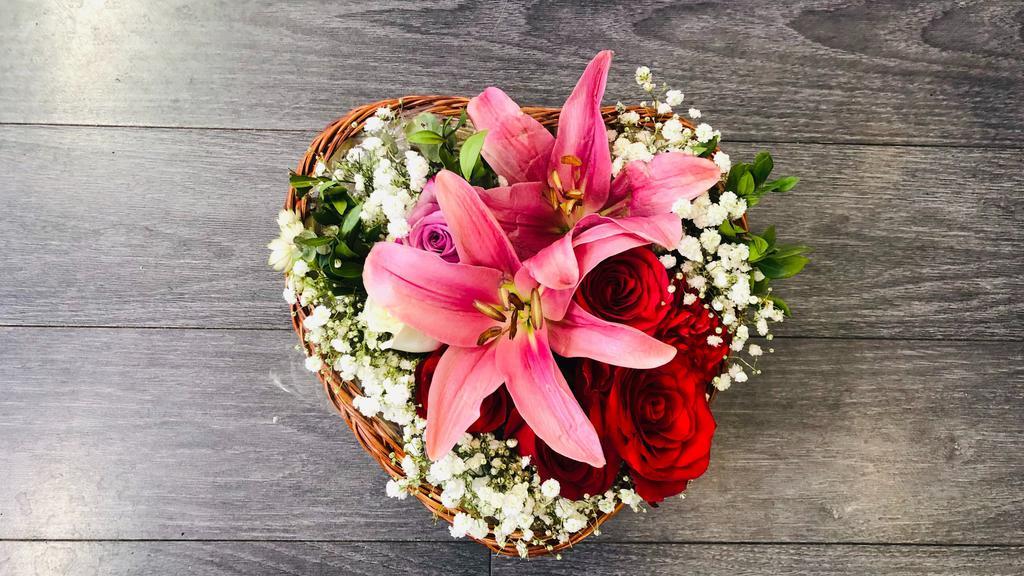 Heart Mix Flower Bouquet · Heart shaped basket filled with different types of natural flowers.
Note:Flowers may changed subject to availability.