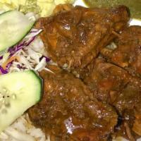 Stew Chicken · Most popular. Pick one : Paratha Roti, Dhal Puri Roti or Rice