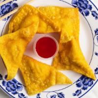 Fried Wontons / 炸云吞 · 10 pieces. Homemade, with sweet and sour sauce.