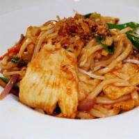 Thai Udon Noodle · Hot and spicy. Red onion, carrots, snow peas, bean sprout, and scallions with fried red onio...