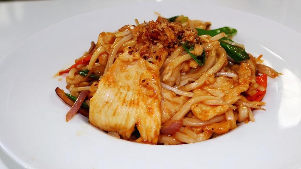 Thai Udon Noodle · Hot and spicy. Red onion, carrots, snow peas, bean sprout, and scallions with fried red onion on top.