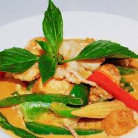 Red Curry Thai Entrée · Hot and spicy. Red onion, bell pepper, baby corn, string bean, fried tofu, and basil cooked ...