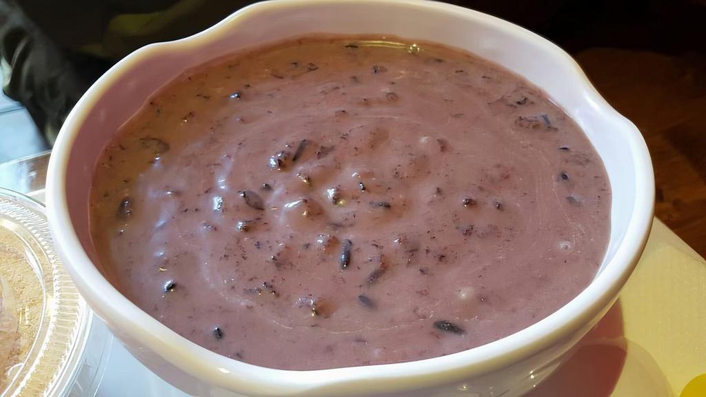 Black Glutinous Rice With Coconut Milk · Traditional southeast asian sweet congee enriched with fresh coconut milk. Gluten free. Vegan.