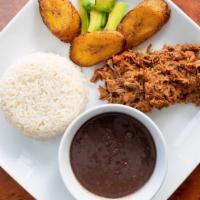2) Pabellon · Rice, beans, shredded seasoned beef, sweet fried plantains and avocado.