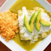 8) Chilaquiles · Fried tortillas in green or red sauce, with cheese, sour cream and avocado with chicken or b...