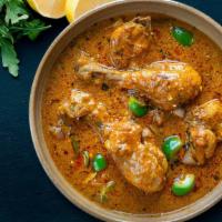 Kadai-Se-Murg · Chunks of chicken seasoned with our special house browned masala with onions, bell peppers a...