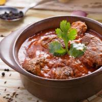 Rogan Josh · A tantalizing mix of herbs and spices flavor this medium kashmiri stew of simmered lamb and ...