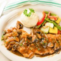 Pollo Al Marsala · Breast of chicken sauteed with mushrooms in a marsala wine sauce, served with vegetable and ...