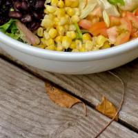 Mango Black Bean Salad · black beans, corn, cilantro, cherry tomatoes, red onion, mango & queso fresco on a bed of mi...