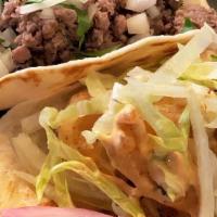 Campechano Taco · shredded beef w/ chorizo, bacon, chipotle & onion
