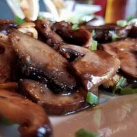 Vegan Asian Stir Fry Mushrooms · Crimini, shiitake, white and baby portobello and garlic teriyaki. Vegan.