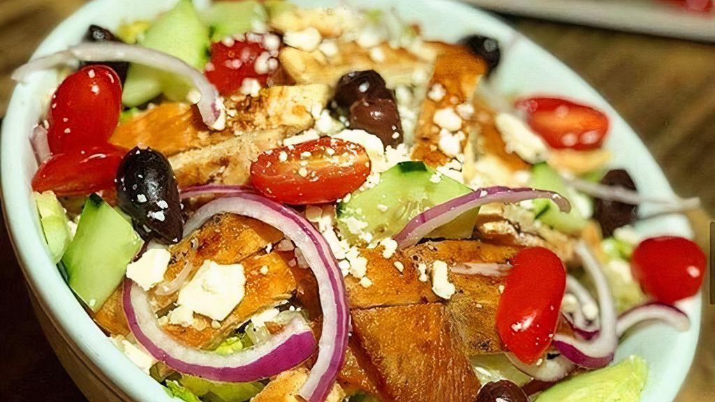 Greek Salad · Romaine, feta, cucumber, croutons, red onion, grape tomatoes, Kalamata olives and lemon vinaigrette.