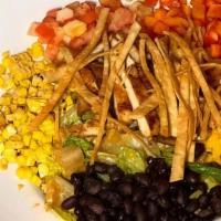 Southwest Blackened Chicken · Avocado,tortilla chips, roasted corn, peppers, black beans, Chipotle lime vinaigrette
