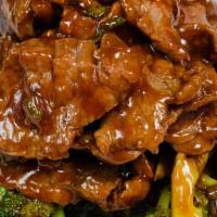 Beef With Broccoli · Stir-fried tender beef and fresh broccoli in a ginger soy sauce. Served with choice of rice.