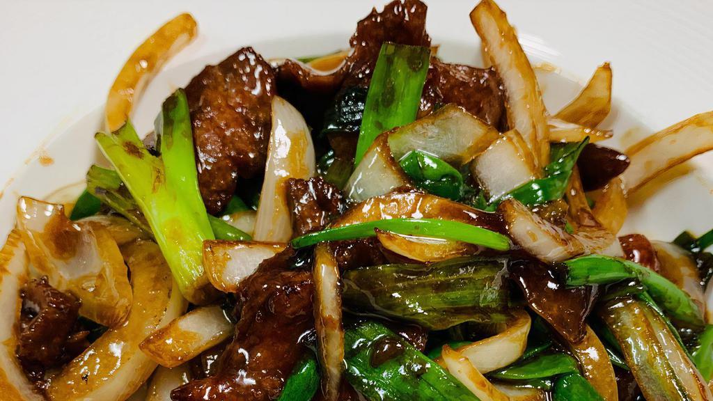 Beef With Scallion · Stir-fried beef and scallions . Served with choice of rice.