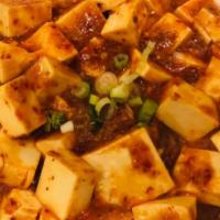 Mapo Tofu · Spicy. Vegetarian. Soft tofu stir-fried in spicy sauce. Served with choice of rice.