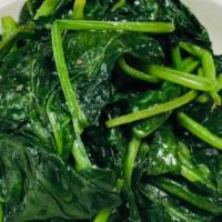 Sautéed Spinach With Garlic · Vegetarian. Served with choice of rice.