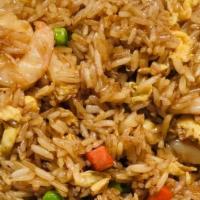 Fried Rice With Shrimp · Prepared steamed white rice, soy sauce, eggs, peas, carrots and green onions.