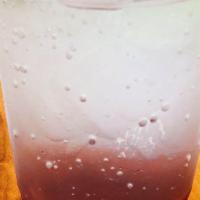 Strawberry Mint Ale · Strawberry juice mixed with seltzer with lime and mint leaves