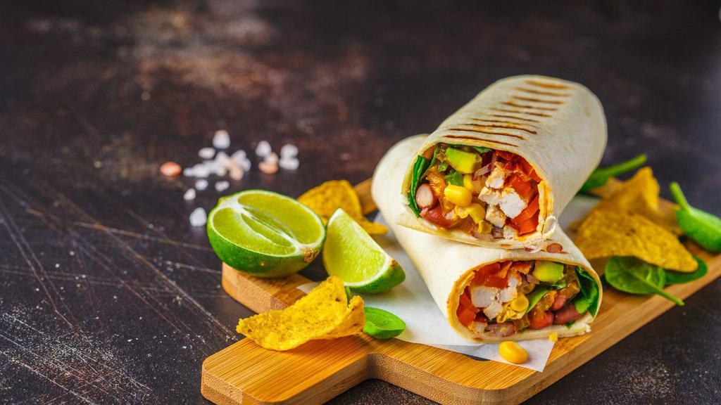Mexican Burrito Wrap · Delicious breakfast wrap made with Eggs, Turkey Bacon, Avocado, Cheddar, Salsa and Home Fries.
