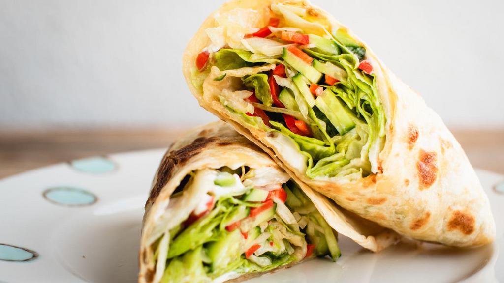 Super Vegetarian Wrap · Delicious breakfast wrap made with Eggs, Mushroom, Spinach, peppers and onions.