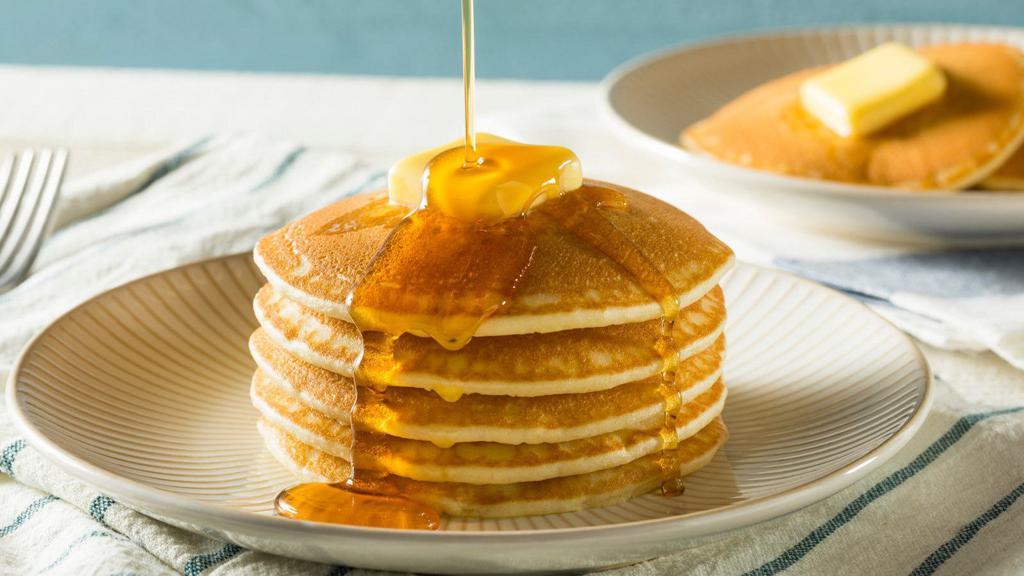 Buttermilk Pancakes With Eggs · Delicious, hot buttermilk pancakes cooked to perfection. Served with 2 eggs cooked to customer's preference.