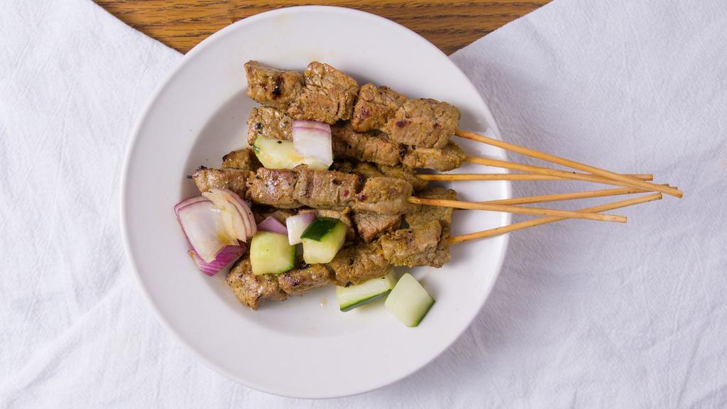 A5 Satay Beef 沙爹牛 (6 Skewers) · Marinated beef satay (skewers) served with cucumbers, red onions and peanut sauce on the side. (six skewers).