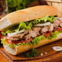 Tuna Sandwich · Hearty tuna salad with fresh and locally grown lettuce, onion, tomato, melted cheddar cheese...